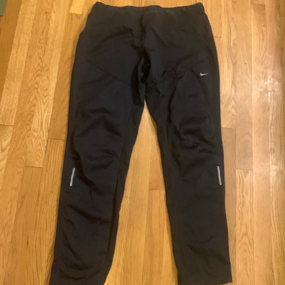 Nike Running women’s pants with zips size large